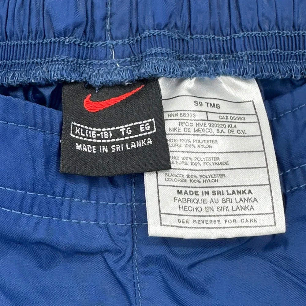 Vtg 90s Nike Kids Blue Nylon Track‎ Pants with Red White Stripe Accent XL READ